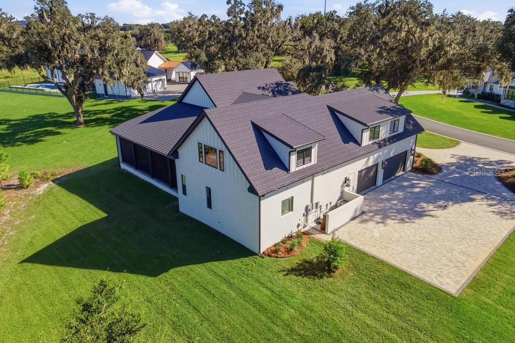 Ariel of home side/ rear view... lots of additional parking room available!