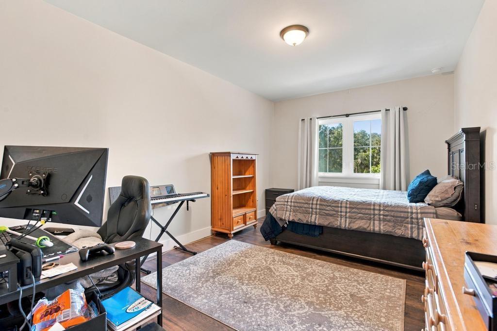 Spacious upstairs fourth bedroom with views
