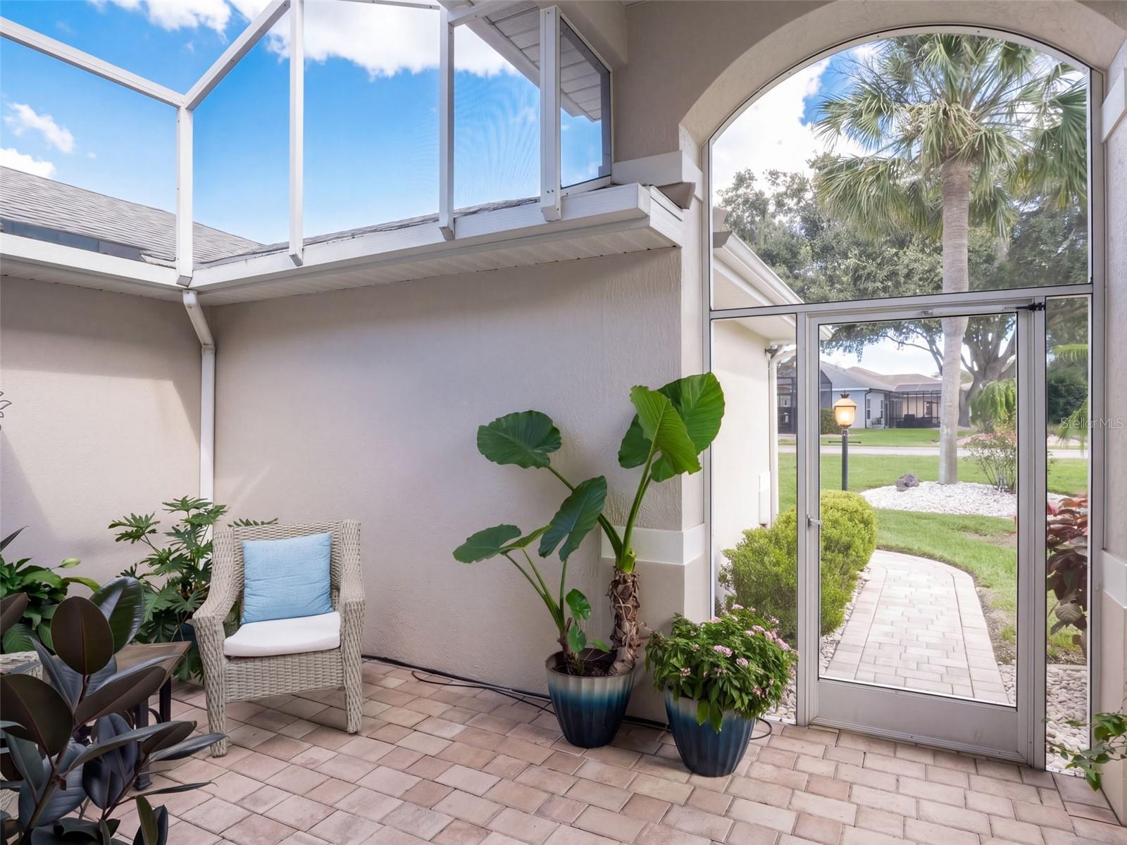 Screened entry and a great place to enjoy your morning coffee