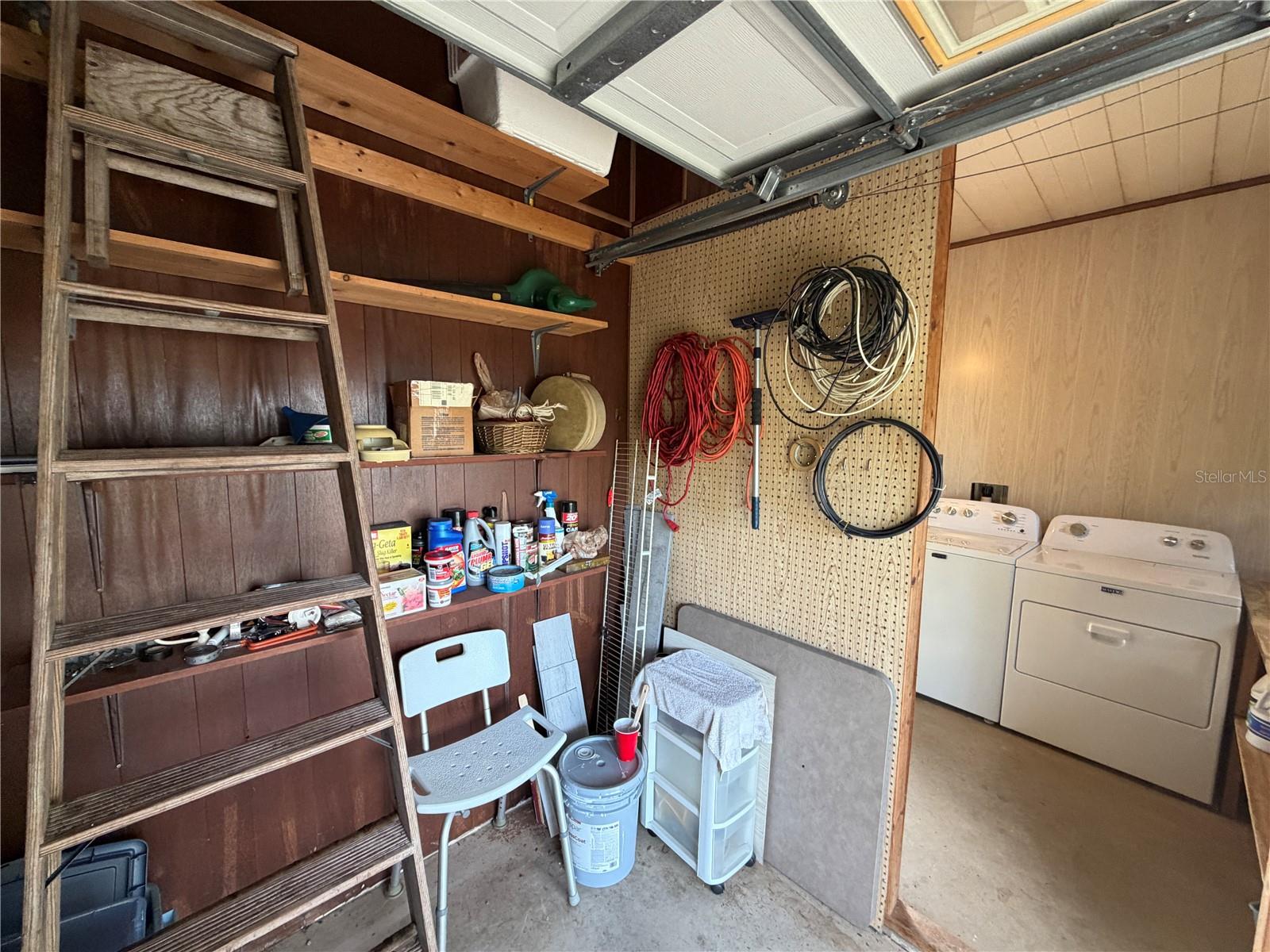 Golf Cart Garage View to Laundry AreaPegboard Walls