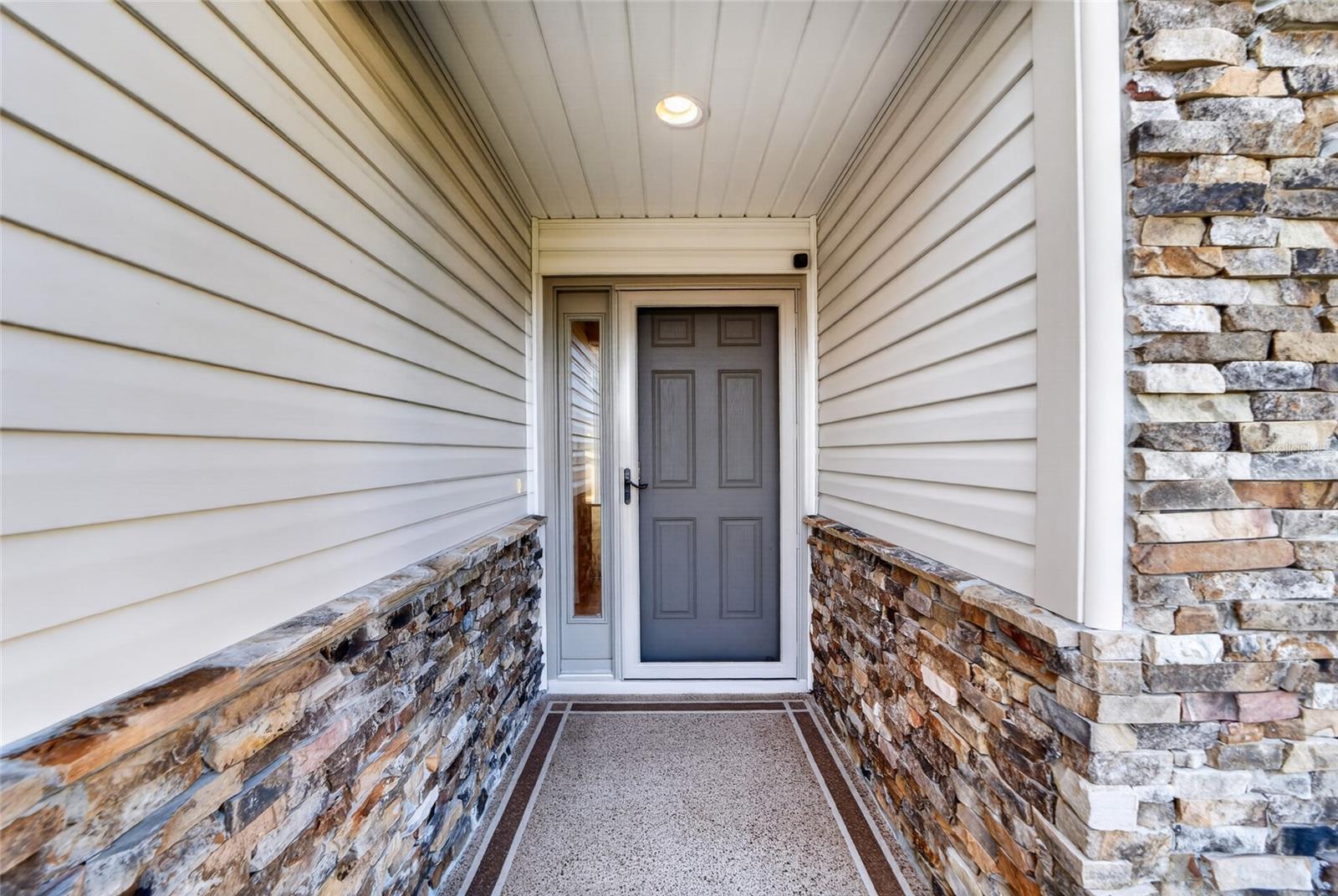 Covered front porch with screen door