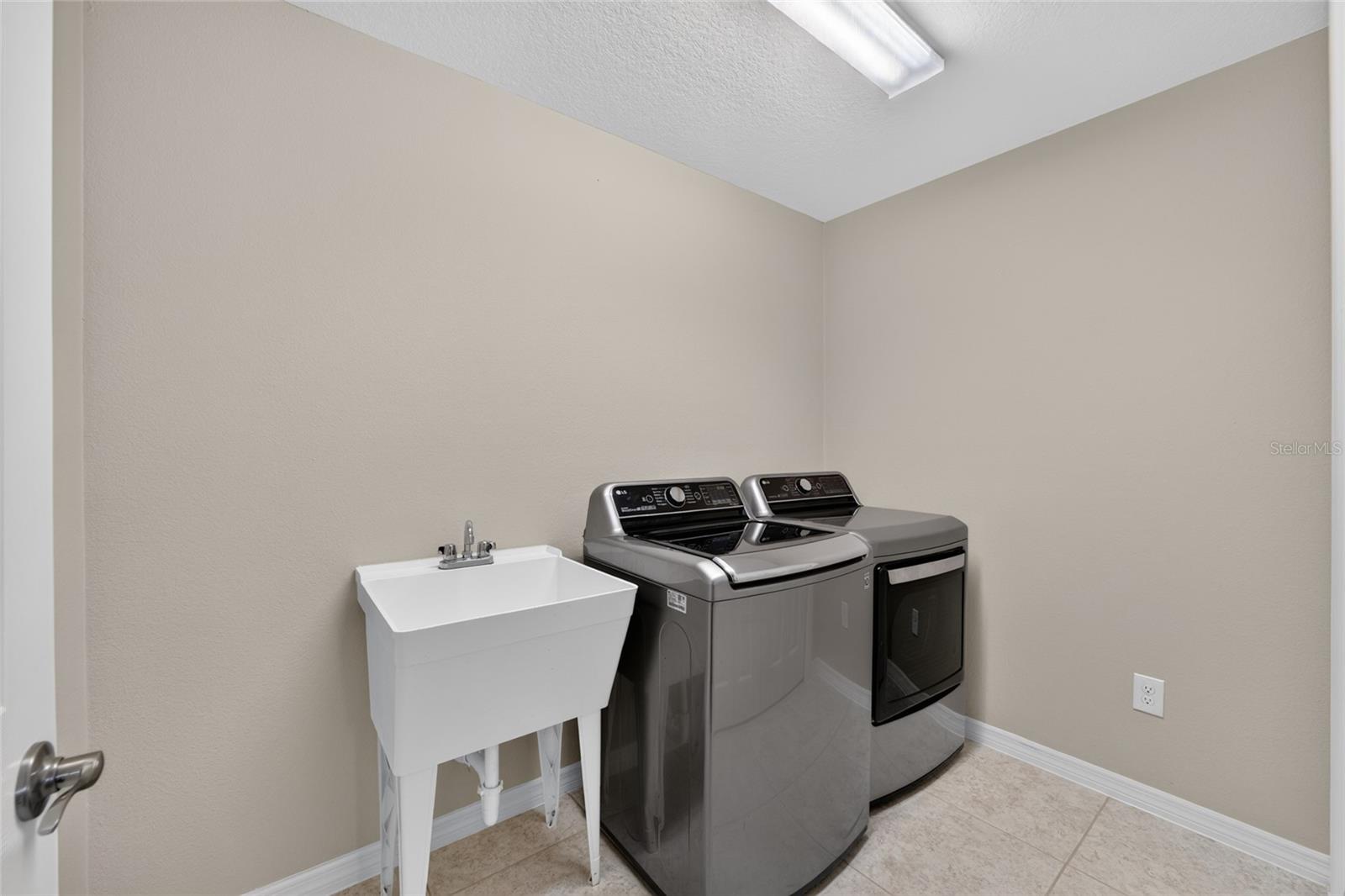 Inside Laundry Room with LARGE CLOSET