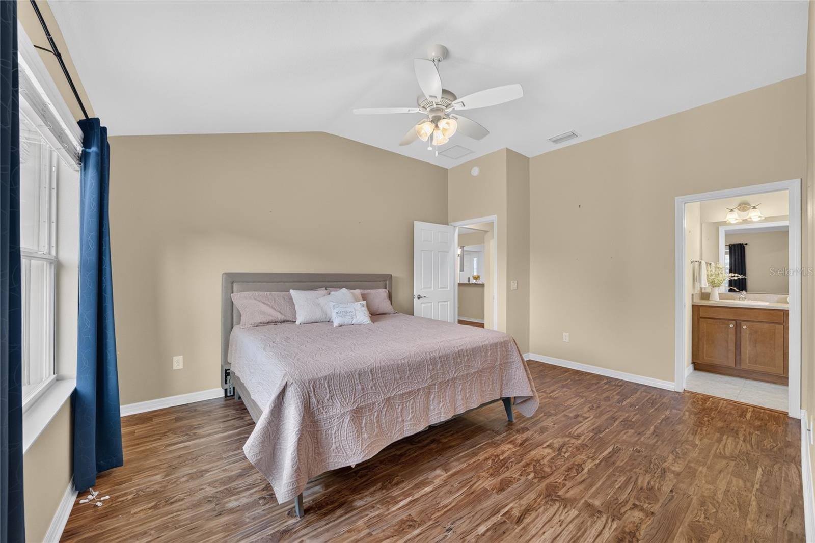 Primary Bedroom with vaulted ceiling and en-suite bath