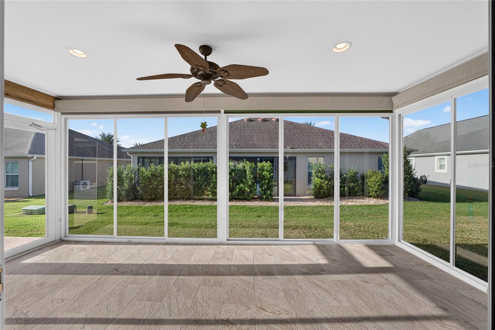 Glass Sliders in Florida Room with Screens