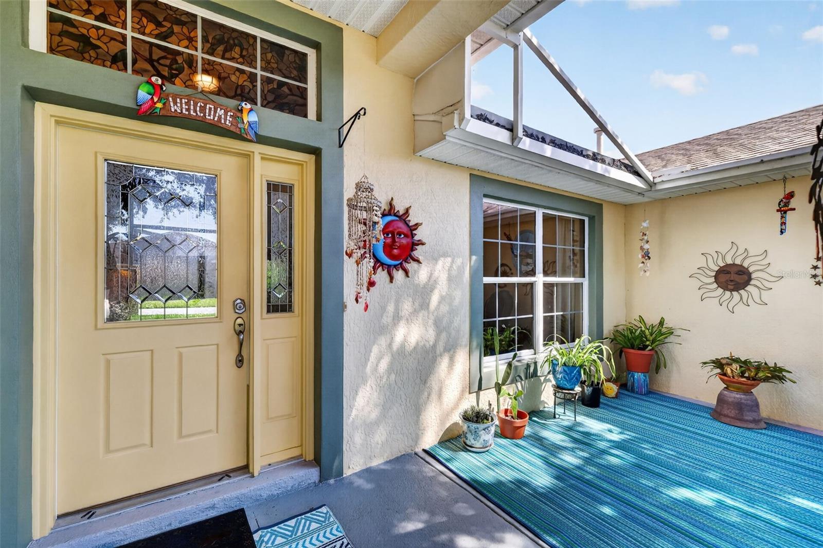 Charming Front Entry with Extended Birdcage