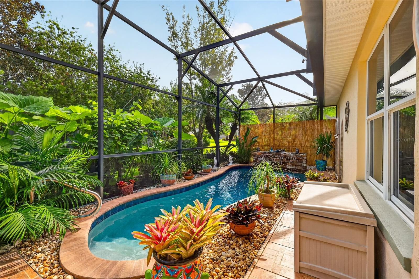 Lagoon Swimming Pool with Waterfall and Tropical PRIVACY Landscaping!