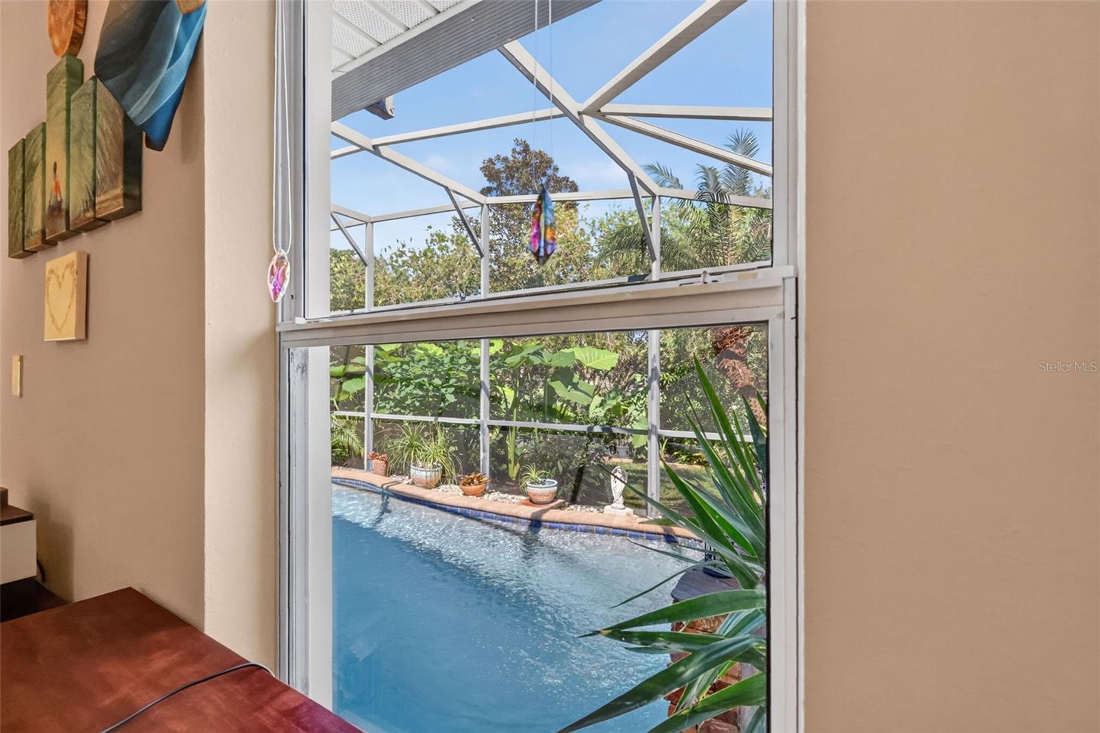 Tranquil Views of Swimming Pool and Tropical Landscaping from Third Bedroom!