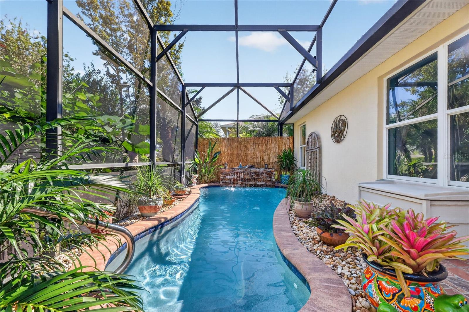 Lagoon Swimming Pool with Waterfall and Tropical PRIVACY Landscaping!