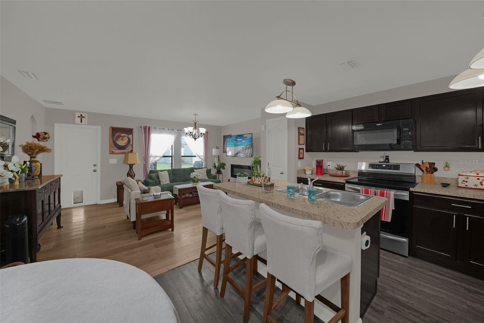 Kitchen with island and breakfast bar