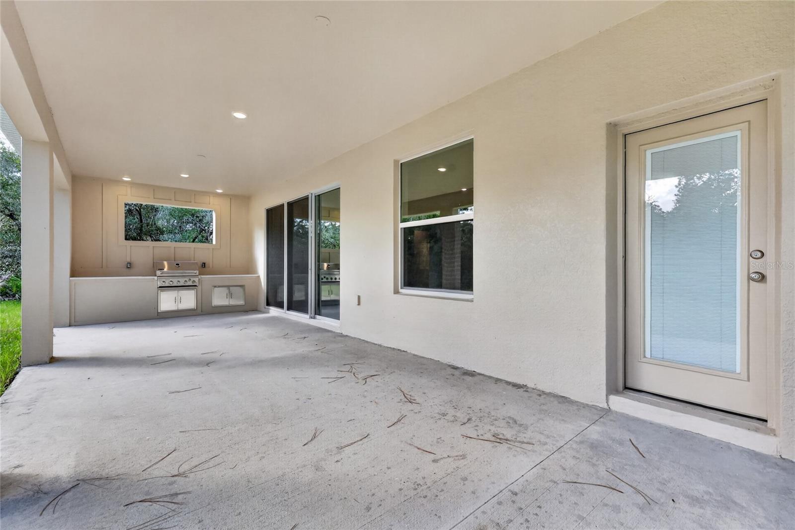 Time to enjoy and have a party on the spacious back covered porch