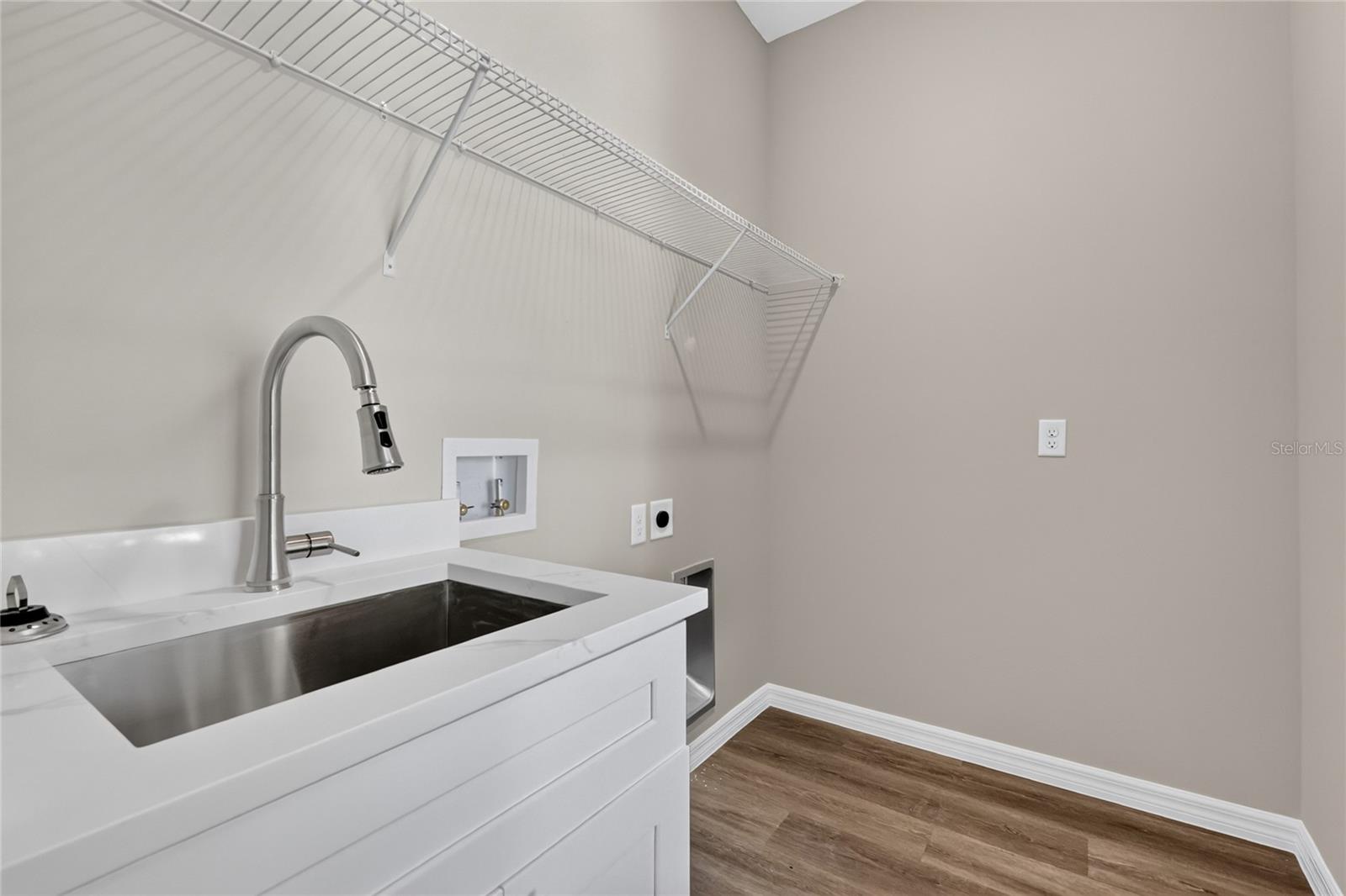 Laundry room with sink