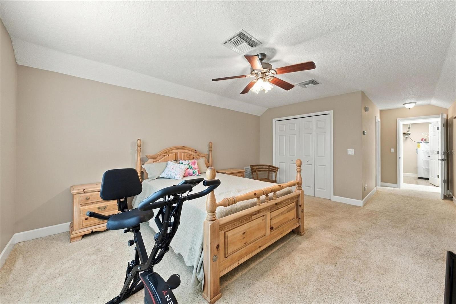 INTERIOR VIEW OF UPSTAIRS PRIMARY SUITE