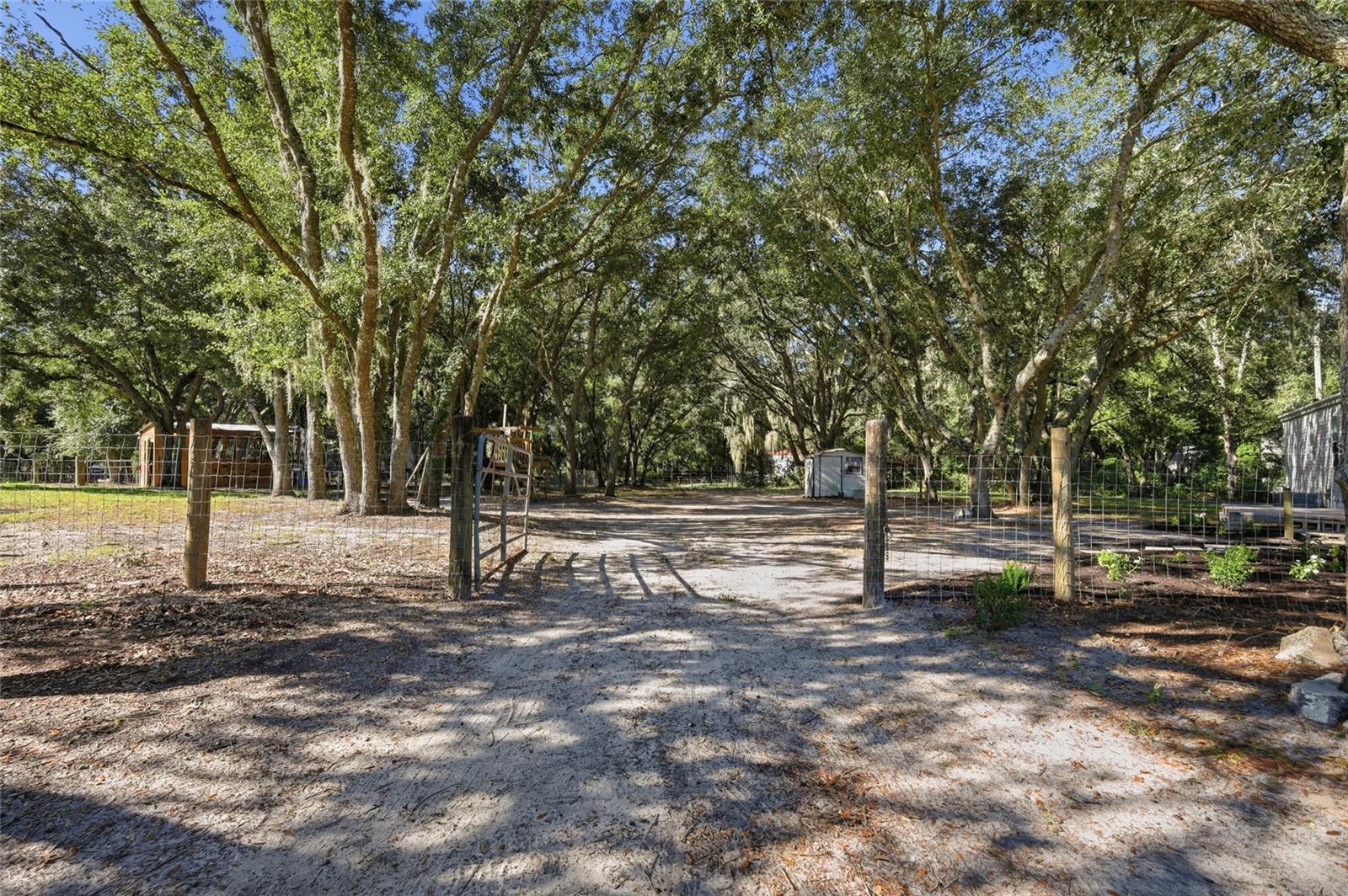 Gate to back of home 1 large of 3 large fenced in areas