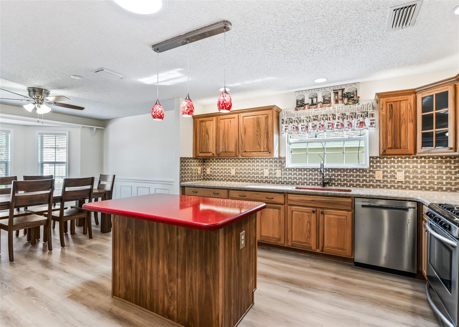 Kitchen Island & Wood Cabinets. Kitchen Island & Wood Cabinets.
