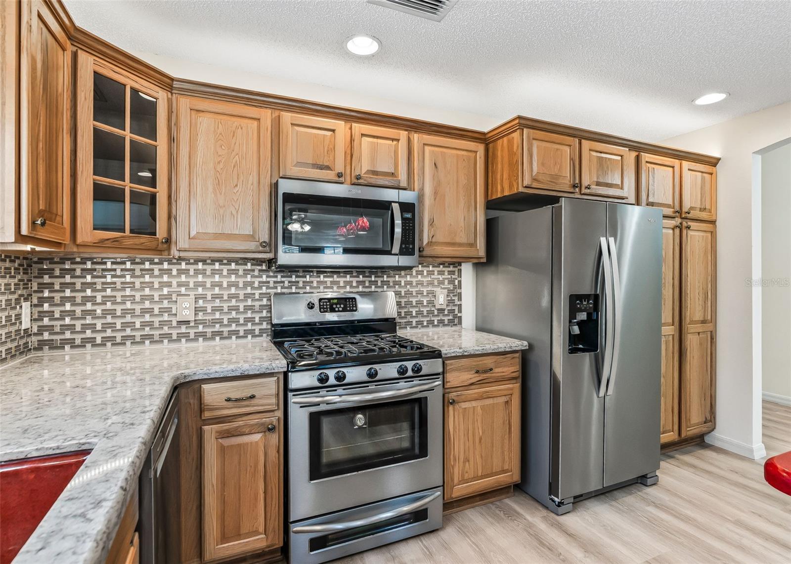 Stainless Steal Appliances & Gas Range.