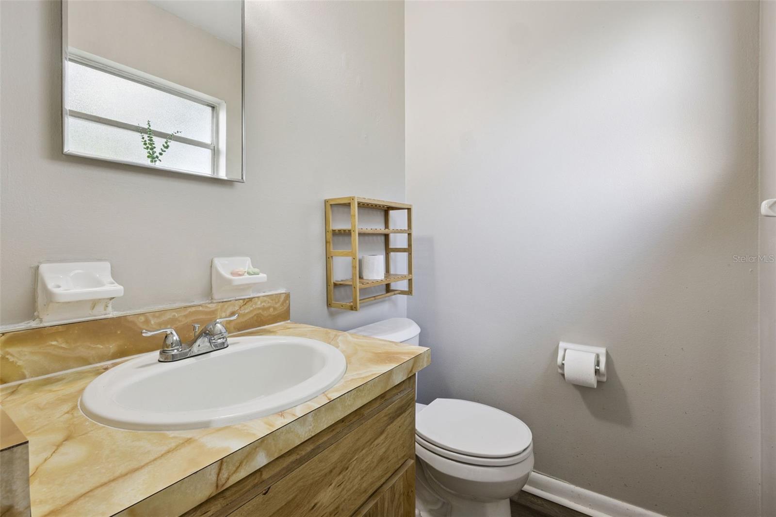 Primary Suite has 1/2 Bath.