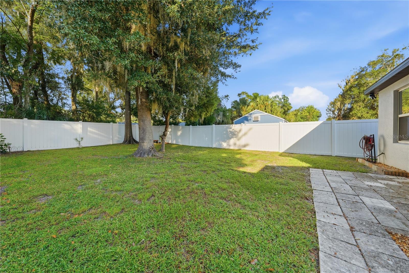 large, fenced backyard