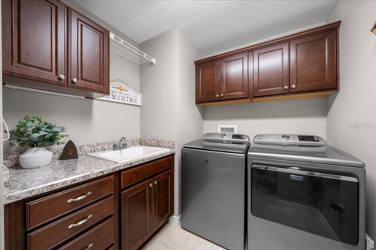 Utility Sink and Overhead Cabinets