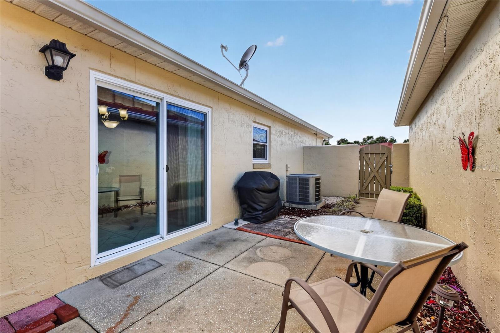 Spacious 45'x11' PRIVATE Side Courtyard and Rear Stoned Yard
