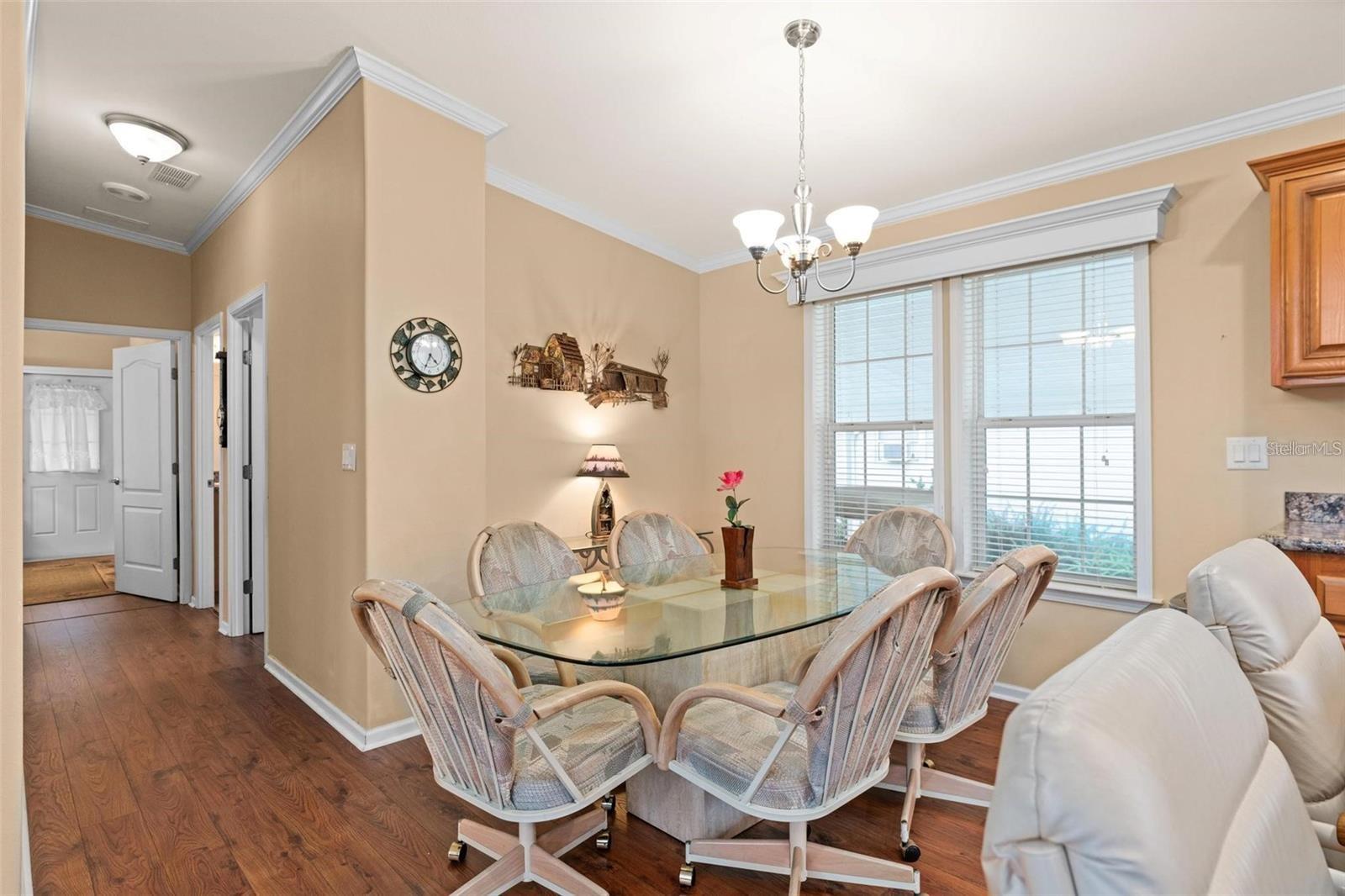 Bright dining room adjacent to kitchen
