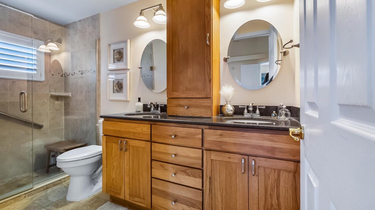 Primary Bathroom With Lots of Cabinets