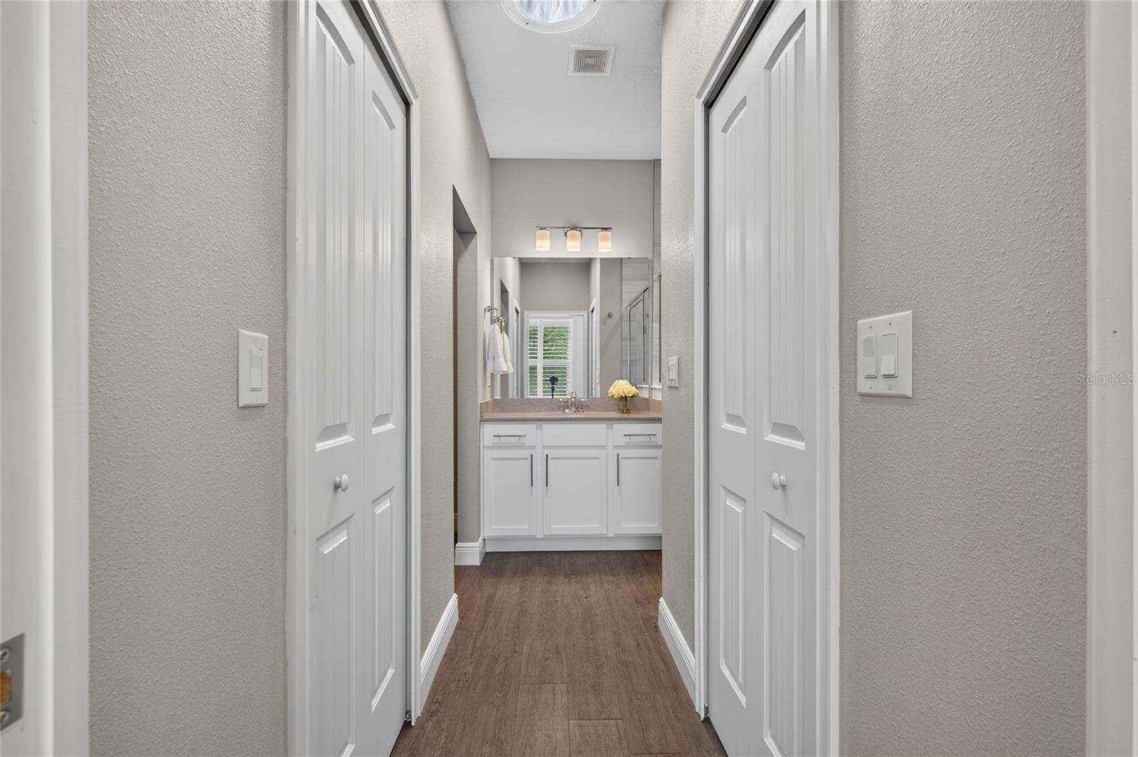 Dual closets in primary bedroom
