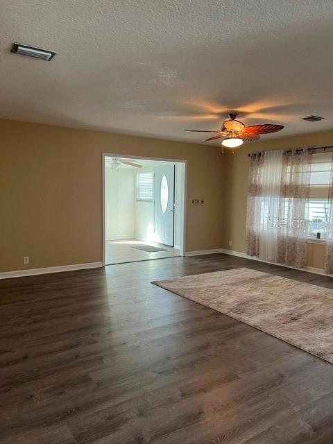 View of Living Room into Florida Room and Entryway