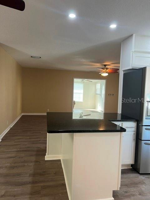 View from Kitchen area to Living Room and into Florida Room