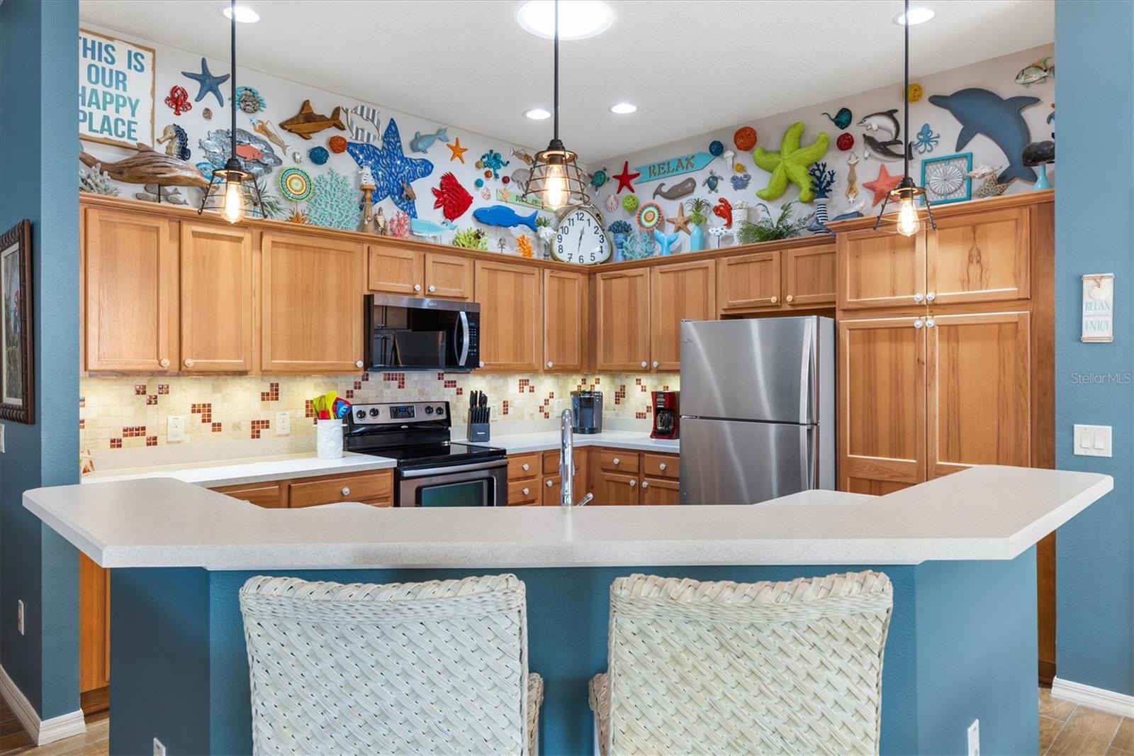 KITCHEN WITH BAR STOOLS