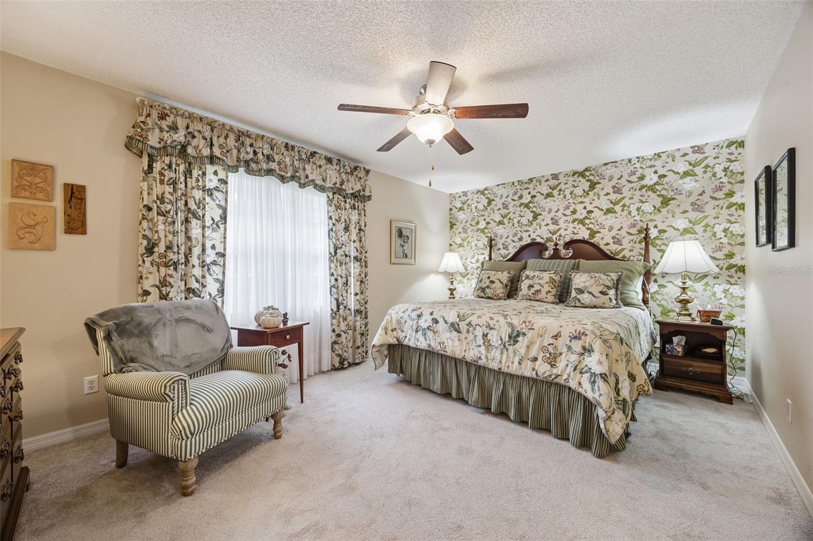 Primary Retreat with en suite bath, walk-in closet and dual add'l closets off the hallway
