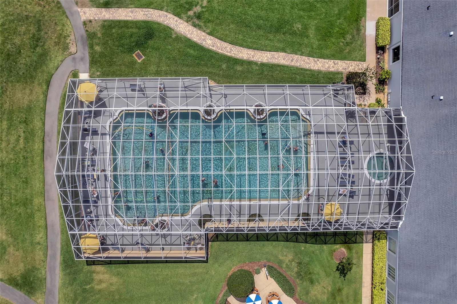 Heated, screened community pool. Heated, screened community pool.