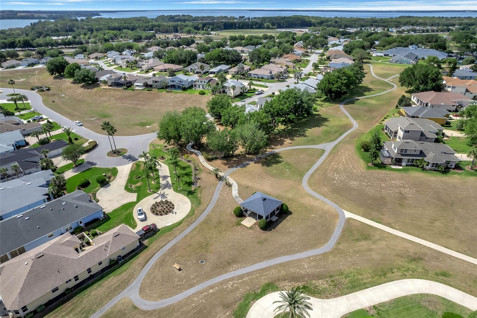 Walking and golf cart paths through the commons green space.