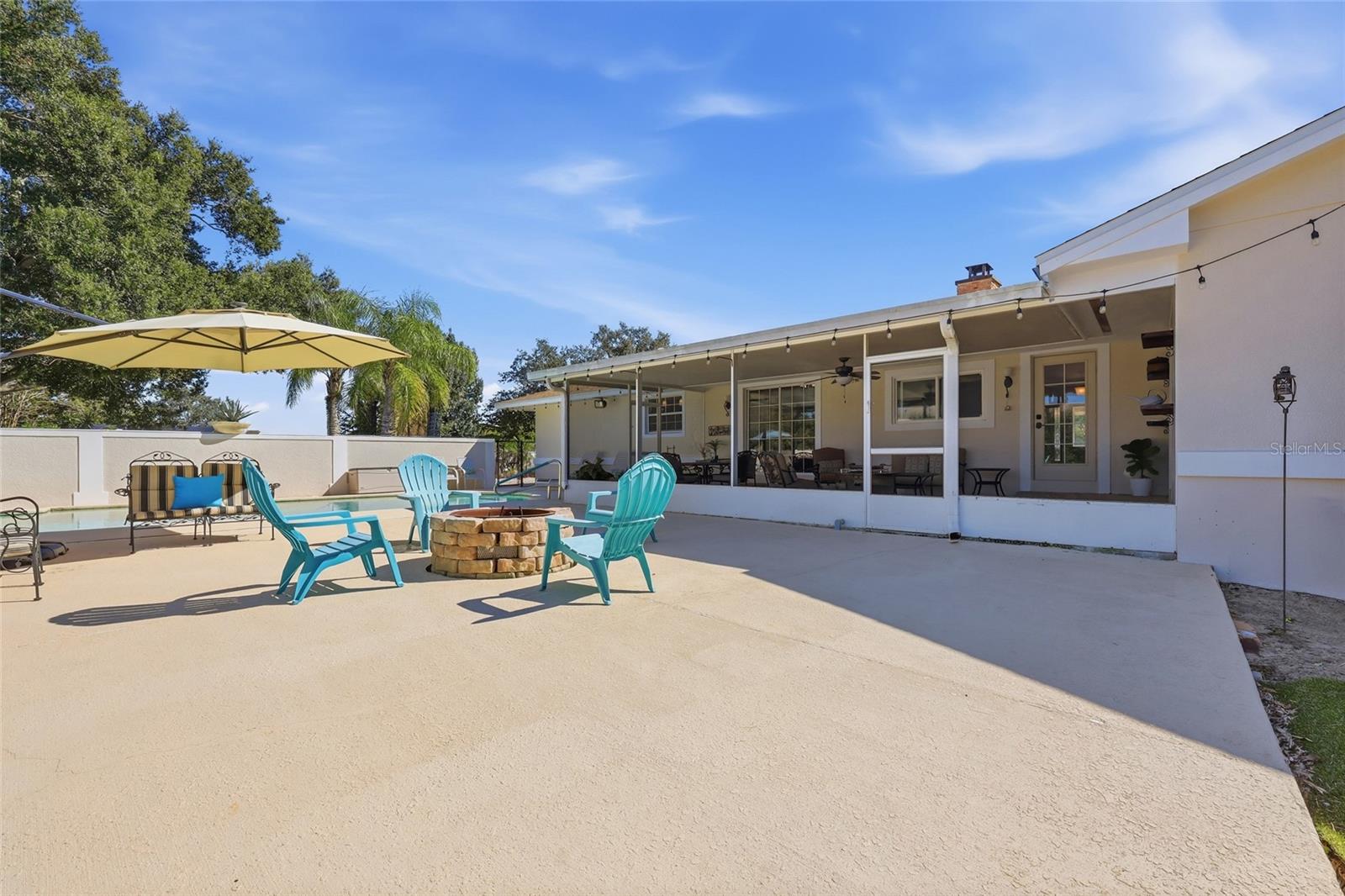 Large deck area with firepit & plenty of seatind area