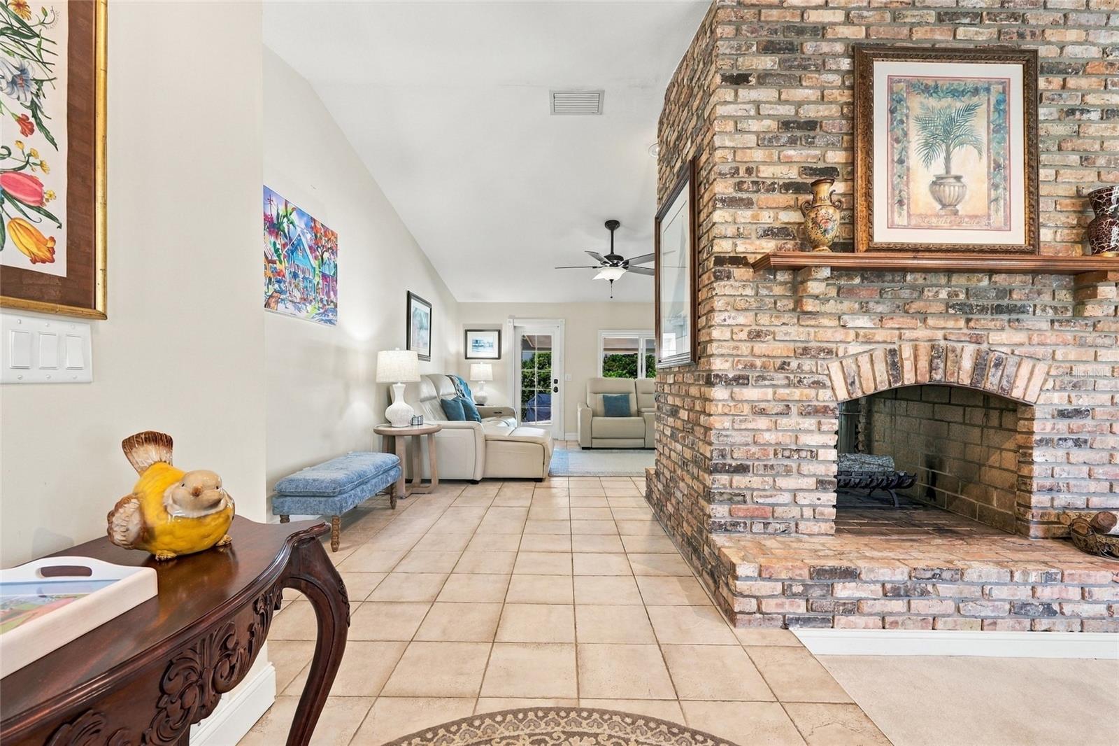 Front entrance with view of see through fireplace