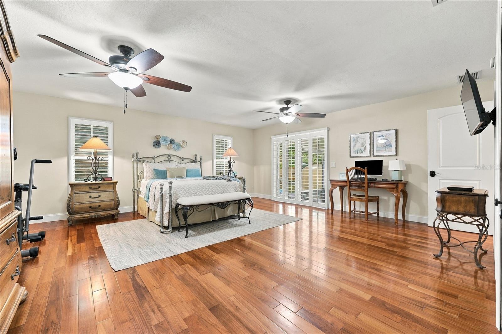 Primary bedroom with doors out to lanai