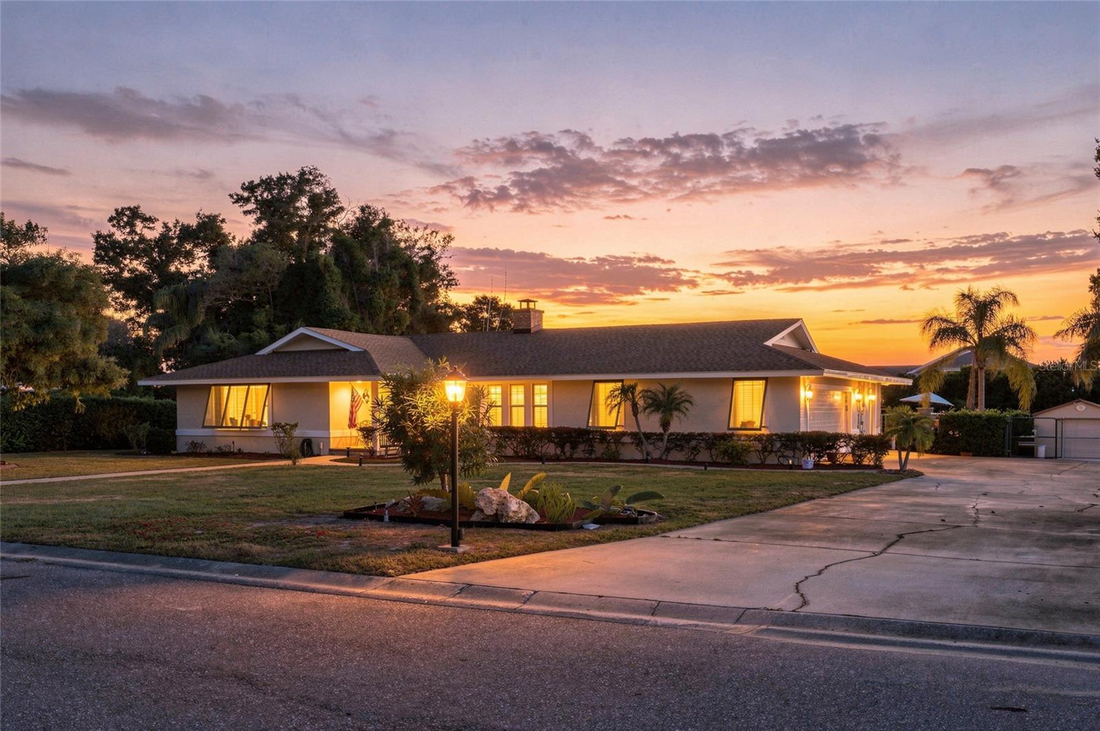 Side of home/ garage at sunset