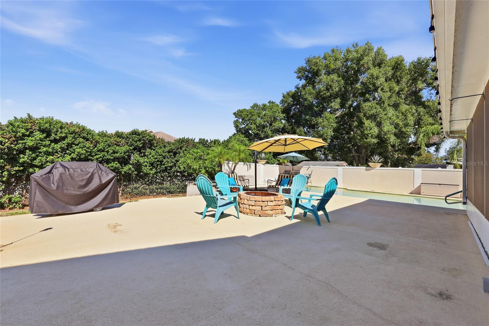 Large deck area with firepit & plenty of seatind area