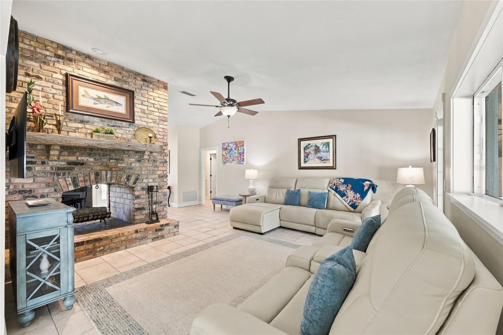 Family room with wood burning fireplace