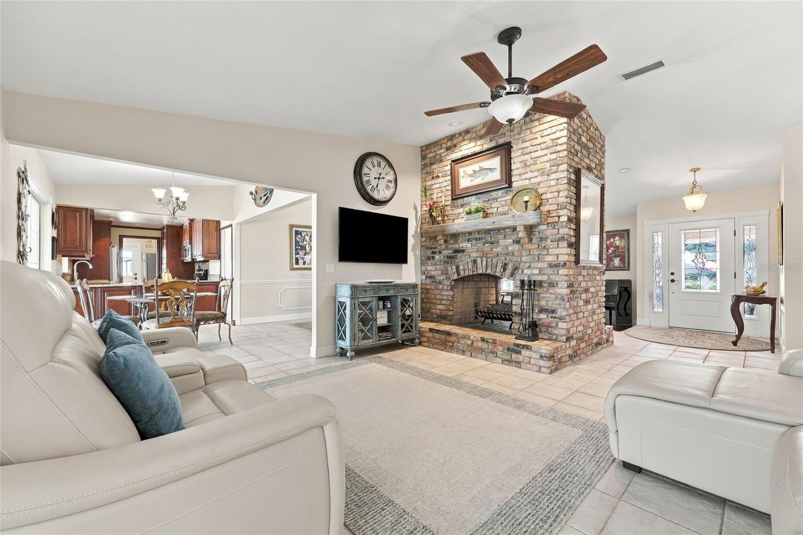 Family room with wood burning fireplace