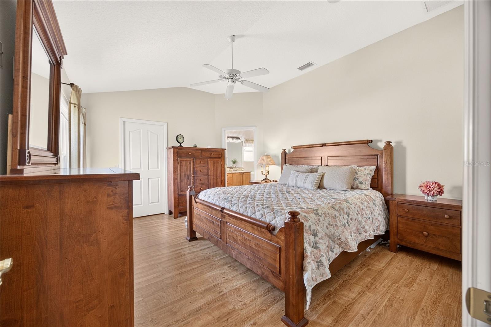 The primary bedroom offers a comfortable retreata welcoming space to unwind and recharge at the end of the day.
