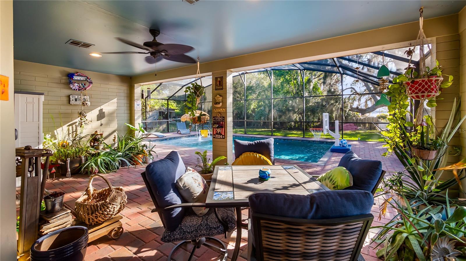 2 sets of sliders from great room to rear covered porch/pool added in 2023