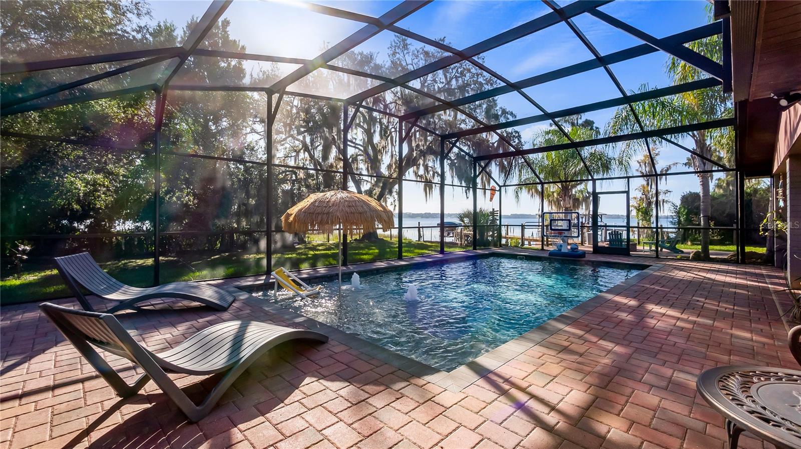 2 sets of sliders from great room to rear covered porch/pool added in 2023