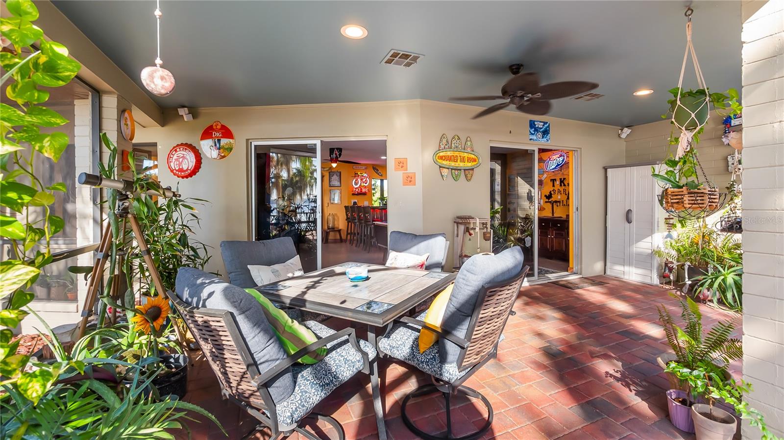2 sets of sliders from great room to rear covered porch/pool added in 2023