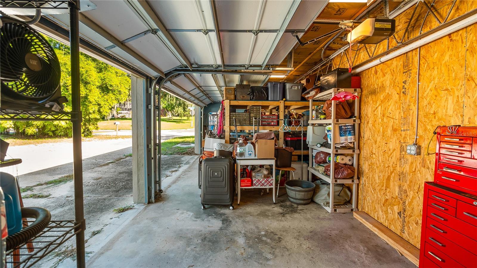 Detached garage and apartment. 2 car parking plus storage. Driveway off Lakeshore drive, little fenced in back yard. Full kitchen, laundry closet. remodeled. Pre wired for generator plug access so it can be run on a generator.