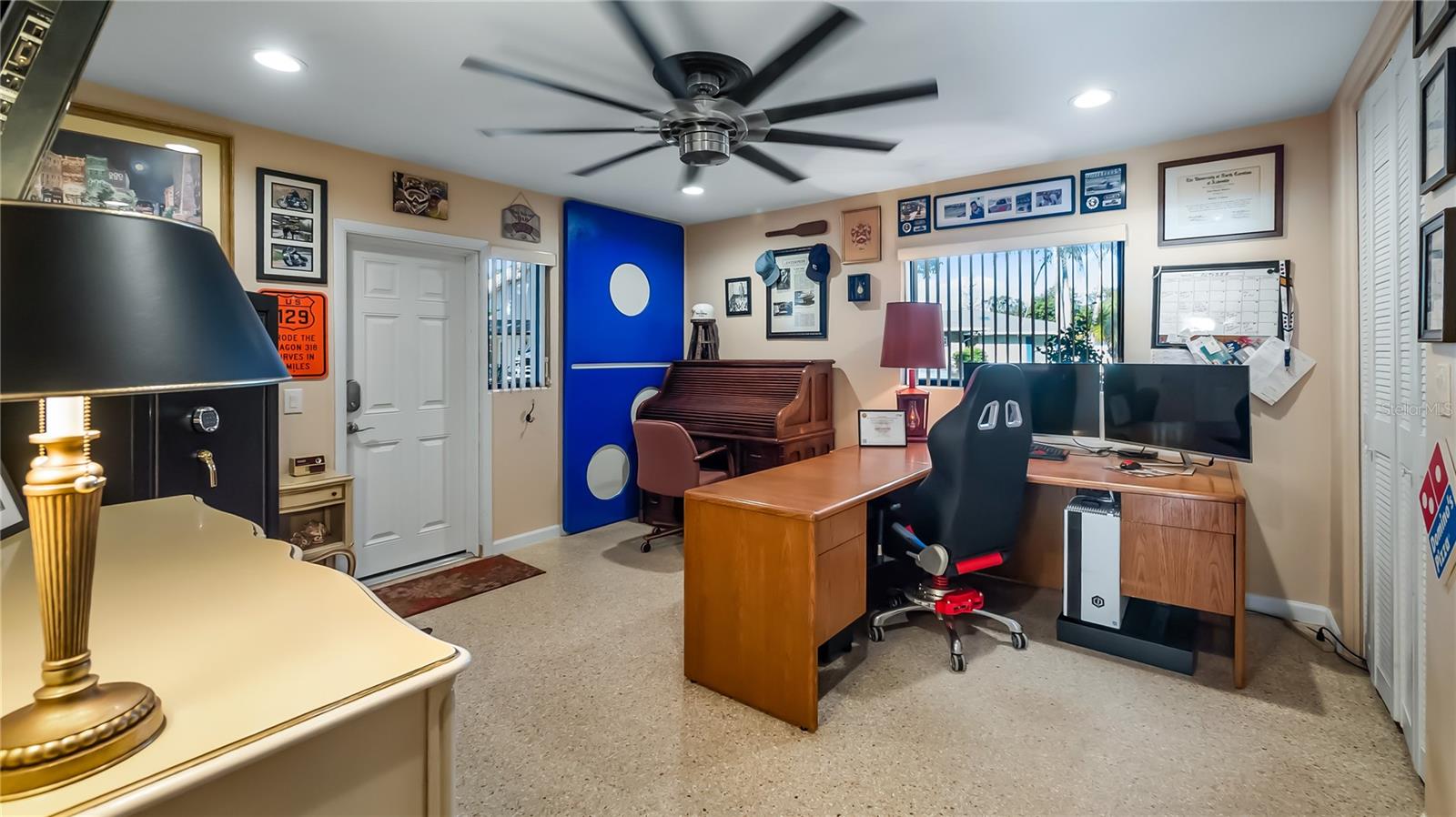 Guest bedroom being used as an office. Private entry off the carport