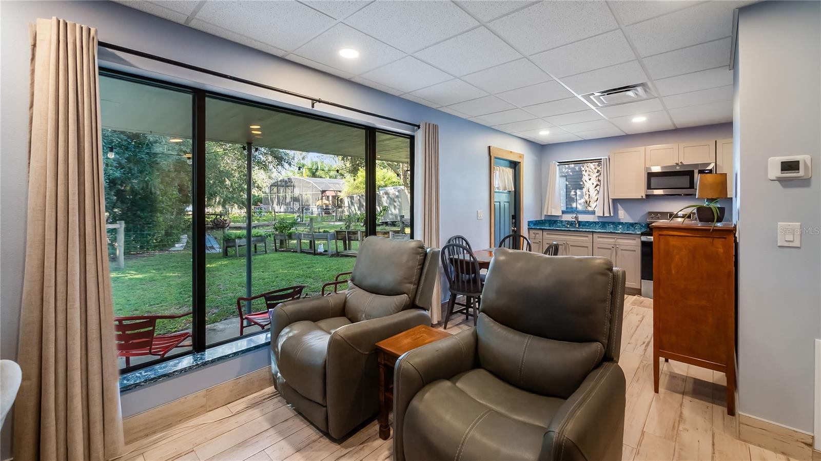 Detached garage and apartment. 2 car parking plus storage. Driveway off Lakeshore drive, little fenced in back yard. Full kitchen, laundry closet. remodeled. Pre wired for generator plug access so it can be run on a generator.