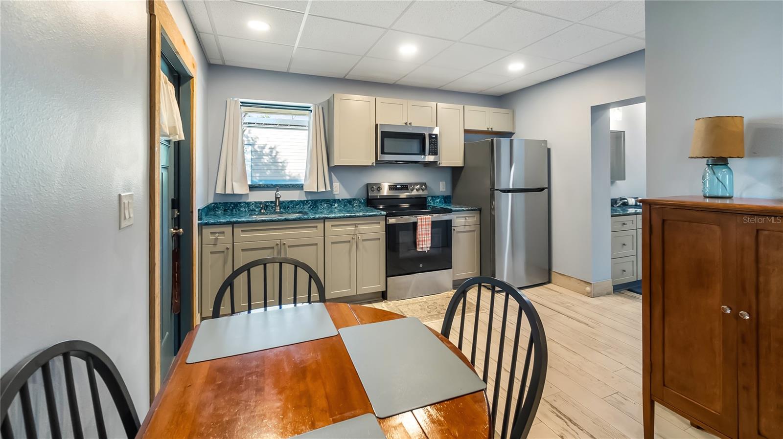 Detached garage and apartment. 2 car parking plus storage. Driveway off Lakeshore drive, little fenced in back yard. Full kitchen, laundry closet. remodeled. Pre wired for generator plug access so it can be run on a generator.