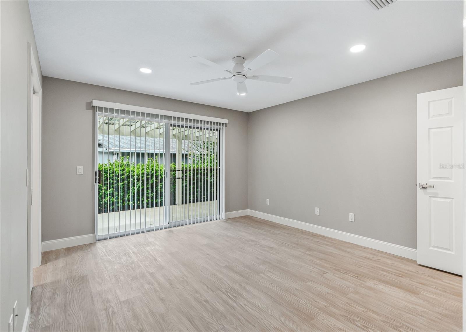 Primary Bedroom with access to covered back porch