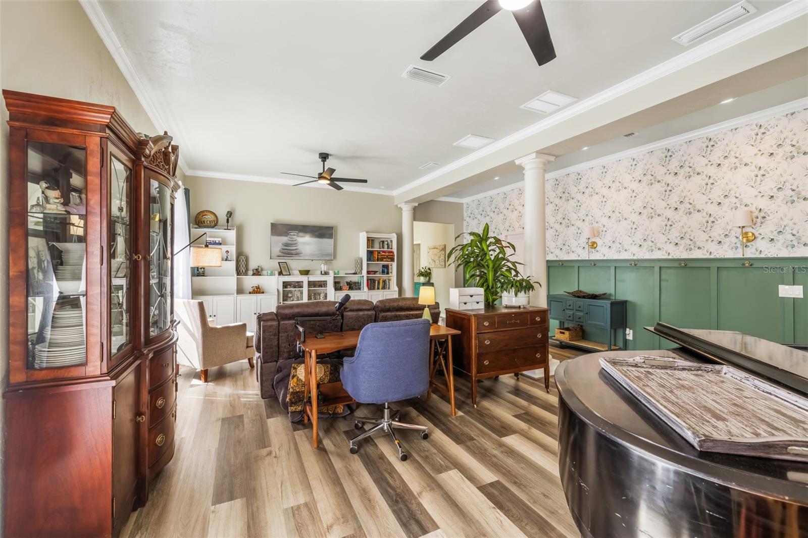 Could be converted to a den and dining area.