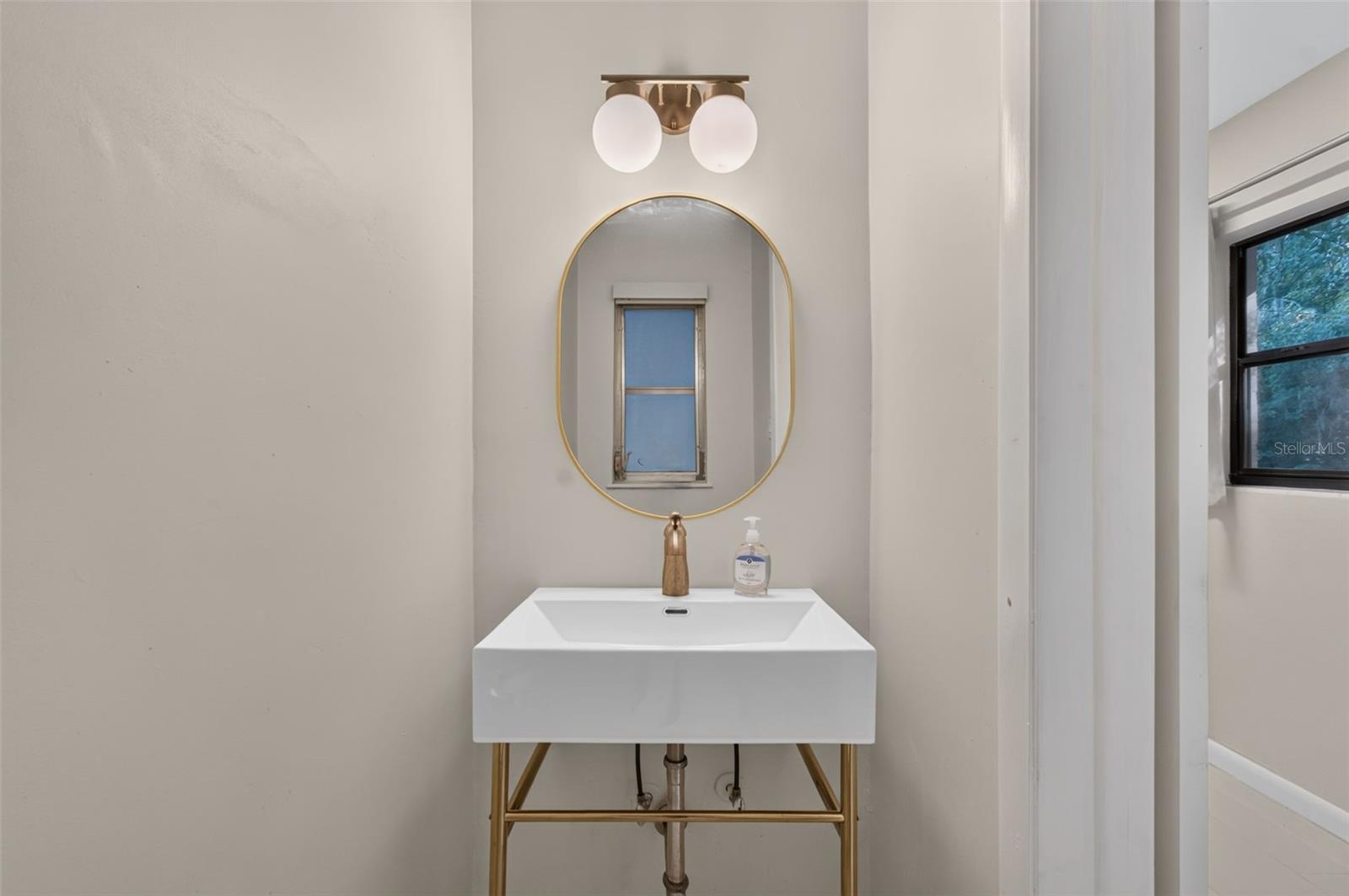 Half Bath in Utility Room